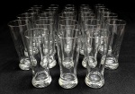 VIDRO, vinte e três (23) flutes para chopp ou cerveja, incolores e translúcidos, marca CISPER (Companhia Industrial São Paulo e Rio; em 1916 a Companhia Vidraria Carmita, fundada em 1908 no Rio de Janeiro, entrou em falência, Olavo Egídio de Sousa Aranha Júnior, maior credor da empresa, adquiriu o maquinário e fundou a CISPER em sociedade com Alberto Monteiro Carvalho; em 1949 inaugurou a segunda fábrica em São Paulo; em 1962 vendeu 79% da empresa para a Owens-Illinois Incorporation; em 2011 vendeu os 21% restantes), acondicionados na caixa original em papelão, sinais de uso, vide foto.