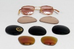 DIVERSOS, oito (8) itens: 1 óculos antigo, contrastado na armação ETOILE (Francês), metal espessado a ouro, falta uma das plaquetas que apoia no nariz, usado; 7 lentes para óculos, algumas marcadas RAY-BAN, vide foto.