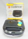 EQUIPAMENTO DE COZINHA, uma (1) chapa anti aderente , marca CADENCE, 127 volts, acondicionada na caixa original (caixa no estado), usada, não testada e sem garantia, vide foto.