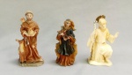ARTE SACRA, três (3) imaginárias distintas, confeccionadas em resina: São Francisco; Santa Rita e São João (possivelmente), medindo a maior 11 cm, vide foto.