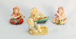 ESCULTURAS, quatro (4) figurativas, confeccionadas em resina policromada, uma delas com castiçal, medindo a maior 10 cm comprimento, sinais de uso, vide foto.