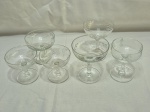Lote de 6 taças abertas em cristal, modelos e tamanhos diversos. Medindo a maior 9cm x 12cm de altura.