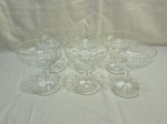Lote de 6 taças abertas em cristal lapidado, sendo 2 tamanhos. Medindo o maior 9,5cm x 11,5cm de altura.