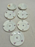 Lote de 7 pires de café em porcelana, marcas e modelos diversos. Medindo o maior 9,5cm de diâmetro.