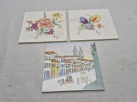 Lote de 3 azulejos decorativos, sendo 2 com pintura de flores e 1 com pintura de cidade. Medindo 15cm x 15cm.