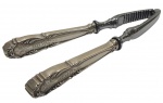 Quebra nozes com cabo em prata portuguesa ,contraste de garantia de teor 917 ml . Peso bruto. 204 gr  Med. 16,5 cm