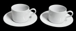 GERMER - Par de xícaras com seus respectivos pires para chá em porcelana branca - 06x11 cm a xícara e 15 diam.