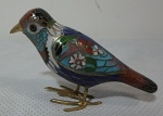 Lindo pássaro de coleção em cloisonné padrãoa zul marinho adirnado com fores multicor. Med. 4cm x 7cm