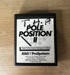 ATARI 7800 - POLE POSITION II - Cartucho de jogo. FUNCIONANDO no momento, sem garantia futura - Para solicitação de mídias adicionais e esclarecimento de dúvidas, entrar em contato através do telefone (21) 99377-0652.