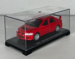 WELLY - Mitsubishi Lancer Evolution VIII - Miniatura de carro em escala 1/43 - Miniatura em metal com pneus de borracha e abertura de portas. Acompanha base expositora e blister de acrílico - med. aproximadamente 12 cm - Peça em bom estado de conservação, vendida no estado em que se encontra nas imagens.