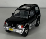 Mitsubishi Pajero Evolution - Miniatura de carro em escala 1/43 - Miniatura em metal com pneus de borracha e abertura de portas - med. aproximadamente 12,5 cm - Peça em bom estado de conservação, vendida no estado em que se encontra nas imagens.