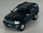 MAISTO - Jeep Grand Cherokee - Escala 1/42 - Miniatura em metal com pneus de borracha. Peça rica em detalhes, com abertura de portas - med. aproximadamente 11 cm - Peça em bom estado de conservação, vendida no estado em que se encontra nas imagens.