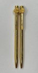 Lote constando de 2 antigas canetas em metal dourado.