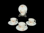 COLOREX (Em 1961, a Vidraria Santa Marina lançou um conjunto de louças), quatro (4) xícaras para café com seus respectivos pires confeccionados em vidro opalinado com pintura de flores e folhagens em policromia, medindo 5x7x6cm.