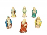 ESCULTURAS ORIENTAIS, seis (6) esculturas confeccionadas em biscuit policromados representando sábios ou imortais (também conhecidos como shouxing ou Confúcio), maior medindo 10cm.