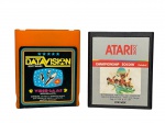 COLECIONISMO, lote composto por duas (2) peças, sendo cartuchos para videogame, compatíveis com o sistema Atari, produção nacional, sendo:  DataVision  Videogame Reprogramável, cartucho multijogos, marca DataVision Software, Indústria Brasileira, em carcaça plástica laranja, com rótulo original e  Championship Soccer (Futebol), cartucho original Atari 2600, fabricado no Brasil pela Polyvox, copyright 1980 Atari Inc., com rótulo ilustrado, não testados e sem garantia de funcionamento.