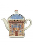 James Sadler & Sons Ltd., de Staffordshire, Inglaterra, Elizabethan House" (Casa Elisabetana), um (1) bule para chá confeccionado em faiança inglesa na tonalidade branca representando Casa Elisabetana esmaltada em policromia, apresenta imperceptível bicado na borda, medindo 15x18x10cm.