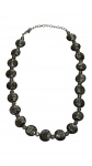 BIJUTERIA, um (1) colar com contas em vidro de Murano na tonalidade preta com decoração interna em pó de prata e cristais facetados em tom fumê, finalizado em metal prateado com fecho tipo lagosta, medindo 53cm de comprimento.