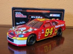 RACING CHAMPIONS Bill Elliott #94 McDonald's Happy Meal 1998 Ford Taurus -  NASCAR escala 1/24, metal fundido, conservado na embalagem original, perfeito.