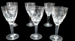 HERING - Conjunto contendo 6 taças para vinho em cristal, com lapidação em baixo relevo. Medidas: 16  x 7,5  cm