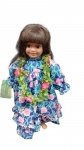 Antiga boneca de coleçao, roupa em tecido e partes em porcelana com traje tipico em tecido, procedencia Havaí , perfeito estado . Altura 32 cm