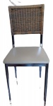 Cadeira em ferro cromado  da Marca ASC  com 5 camadas de cromado de excelente qualidade , encosto em rattan e assento em courino marfim  , medindo 90 x 42 x 42 cm ( perfeito estado )