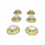 Jogo 6 Xícaras de Chá em Porcelana  amarela / branca decorada com folhas nos tons amarelo, verde e azul . Excelente estado de conservação, medindo  6  X  8,5 cm ( sem marca de fabricação )