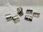 Lote de 6 argolas de guardanapo diversas em prata 90. Medindo a maior 4,5cm de diâmetro.
