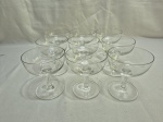 Jogo de 9 taças abertas em cristal incolor. Medindo 9cm x 10cm de altura.