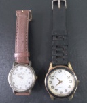 2 Relogios !! para conserto ou tirar peças !! marca Champion com pulseira modelo de couro !! e outro marca generica com pulseira de borracha preta !!
