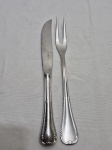 Garfo trinchante e facão em aço inox Hercules. Medindo a faca 27cm de comprimento, garfo 26cm de comprimento.