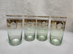 Jogo de 4 copos longo de água, suco em cristal furtacor, lapidado com friso ouro. Medindo 7,5cm x 14,5cm de altura.