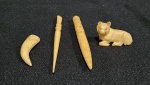 4 peças de marfim. Medindo a maior 10.5 cm e a menor 3.5 cm