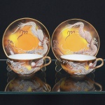 PORCELANA JAPONESA, par (2) xícaras de chá, ditas casca de ovo, ornamentação policromada na técnica Moriage, representando Dragão Celestial, arremates a ouro, uma delas com trincado na borda, ideais para coleção de cristaleira, sinais de uso, vide foto.