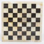 DIVERSOS, um (1) tabuleiro de xadrez ou dama, confeccionado em ônix nas tonalidades preta e branca, faltam as pedras, medindo 19,5 x 19,5 cm, sinais de uso, vide foto.