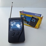 MINI TV 5` Colorida e rádio AM/FM portátil COASTAR, CERTC 2808ULT com caixa de pilhas. Peça no estado das fotos, sem testes de funcionamento.