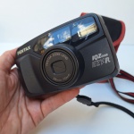 Câmera Fotográfica Analógica PENTAX IQZOMM EZY-R. com capinha. Peça no estado das fotos, sem testes de funcionamento.