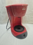 Cafeteira elétrica da Oster, modelo BVSTDCDW12R-017. Não acompanha o bule.