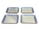 NORITAKE e VARIG, quatro (4) petisqueiras retangulares confeccionadas em porcelana na tonalidade branca com arabescos na tonalidade azul e borda filetada na tonalidade rouge, medindo 16x13,5cm.