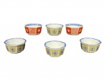 NORITAKE e VARIG, lote com seis (6) recipientes para sobremesa oitavados confeccionados em porcelana na tonalidade branca com pintura floral e geométrica, sendo 2 nas tonalidades rouge de fer e azul e  4 na tonalidade amarela e azul, medindo 4,5x9x9cm.