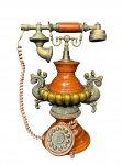 DIVERSOS, um (1) telefone de gancho confeccionado em madeira escalonada com bojo em resina decorado em gomos, perolados, caneluras e alças finalizadas em volutas, fone com guarnições em metal com patina envelhecida, não testado e sem garantia de funcionamento, medindo 41x25cm. Em excelente estado de conservação.