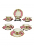 PORCELANA JAPONESA, seis (6) xícaras para café com seus respectivos pires confeccionadas em porcelana na tonalidade branca, espessa faixa nas tonalidades rosa e amarela com decoração floral em policromia e geométrica em douração, medindo 4,5x9x7cm.