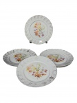PORCELANA MAUÁ, seis (6) pratos para sobremesa confeccionados em porcelana nacional na tonalidade branca, decorado por flores e folhagens em policromia e guirlanda floral em vasta douração com elementos vegetalistas em relevo na pasta, possui falhas na pintura e na douração, medindo 18,5cm.