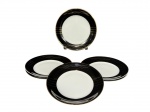 PORCELANA SCHMIDT, seis (6) pratos para sobremesa confeccionados em porcelana nacional na tonalidade branca, borda com espessa faixa na tonalidade preta decorado por frisos ondulados em ouro, medindo 19cm.