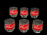 VIDROS, seis (6) copos para whisky confeccionados em vidro translucido com pintura de faixa vermelha com inscrição WHISKY na tonalidade branca, medindo 8,5x7cm.