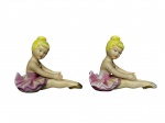 ESCULTURAS, par (2) de esculturas confeccionadas em porcelana na tonalidade branca representando bailarinas, com esmaltagem em policromia e realces em ouro com falhas na douração, medindo 8,5x10,5x6cm.