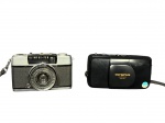 FOTOGRAFIAS, lote com duas (2) câmeras fotográficas, sendo: A) 1 Olympus Stylus Zoom DLX, acondicionada em estojo original, filme de 35mm, não testada e sem garantia de funcionamento e B) 1 Olympus Pen EES-2, Lente D.Zuiko 28mm f/2.8, sinais de uso, não testada e sem garantia de funcionamento.