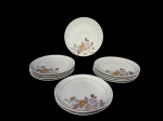 PORCELANA STEATITA, onze (11) pratos para sobremesa confeccionados em porcelana nacional na tonalidade branca, decorada por flores e folhagens em policromia e filete em ouro, medindo 19cm.