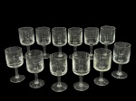 <b>VIDROS</b>, doze (12) taças para vinho confeccionados em vidro translucido, haste cilíndrica, apoiada sobre base circular, medindo 13x5,5cm. 1 apresenta bicado.