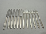 Jogo de 6 garfos de bolo e 6 facas de fruta em prata 90 alemã WMF. Medindo a faca 17cm de comprimento, garfo 16cm de comprimento.